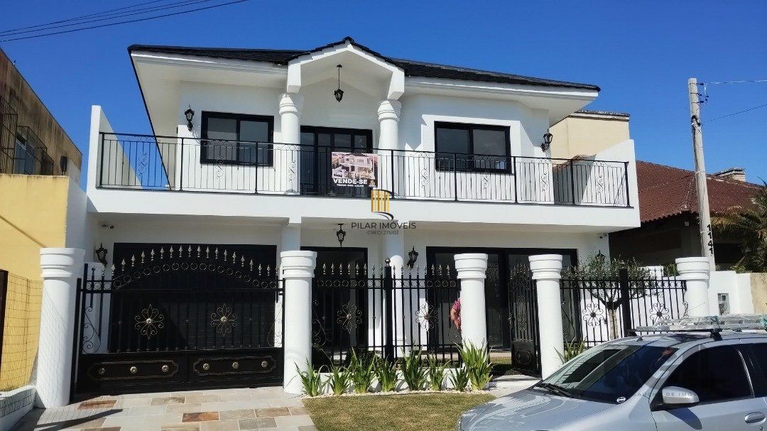 Casa 5 dormitórios no bairro Atlântida