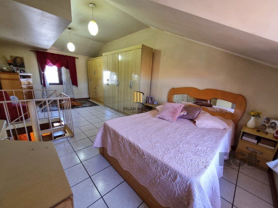 Casa de Condomínio 3 dormitórios no bairro Camaquã