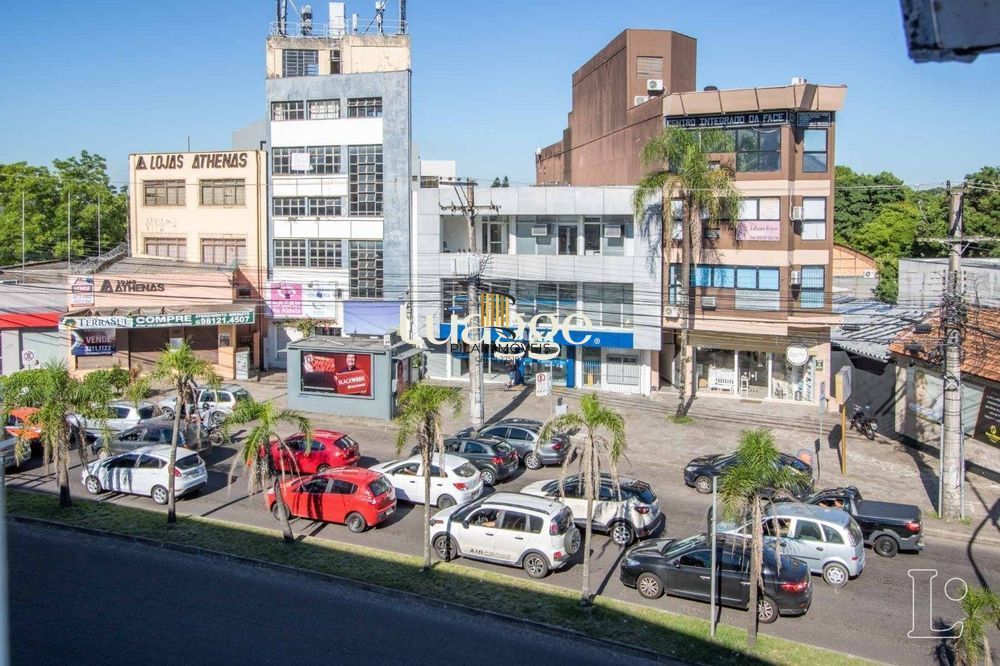 Sala comercial com 22m² de área privativa, frente, piso cerâmico, equipada com lavabo e ar-condicionado split