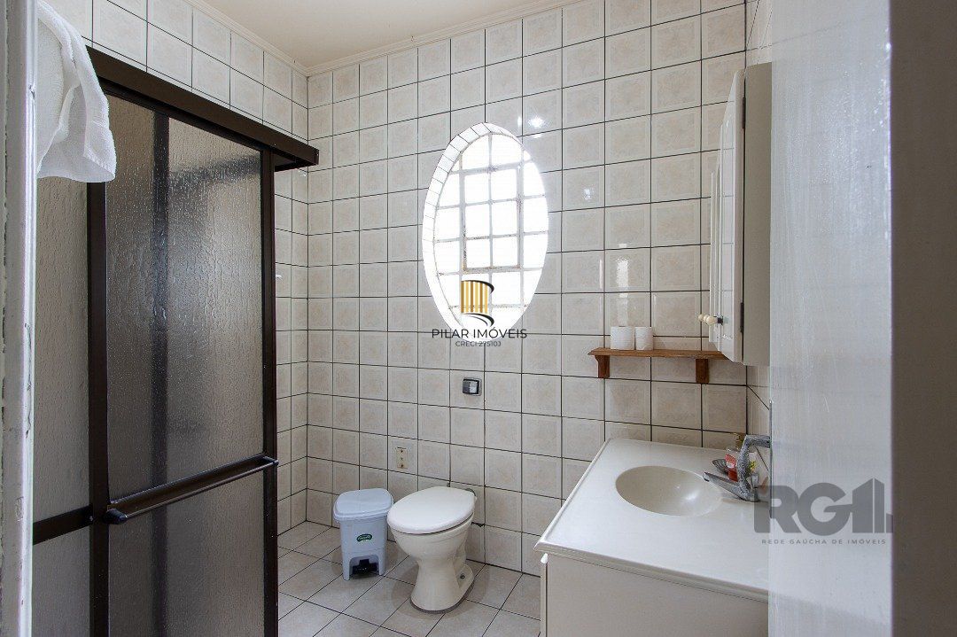 Casa 5 dormitórios no bairro Ipanema