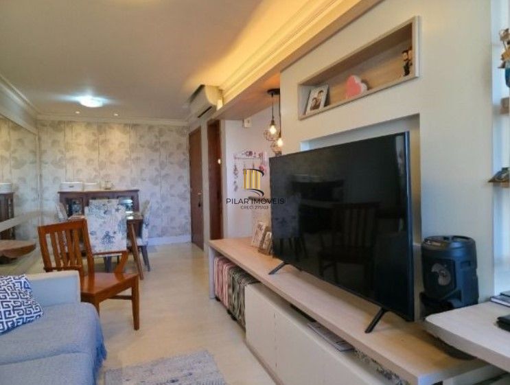 Apartamento  com 2 dormitórios, lavabo, banho social e churrasqueira integrada.