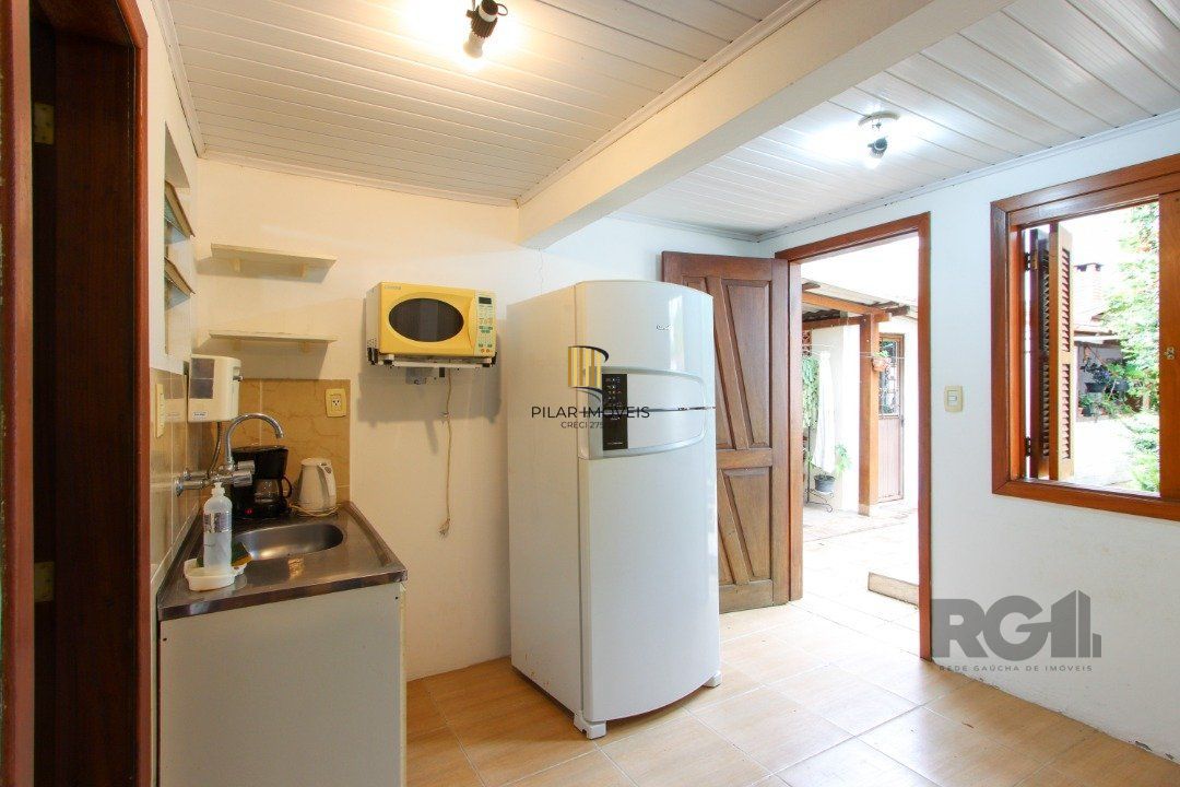 Casa térrea com  hall de entrada ,4 dormitórios