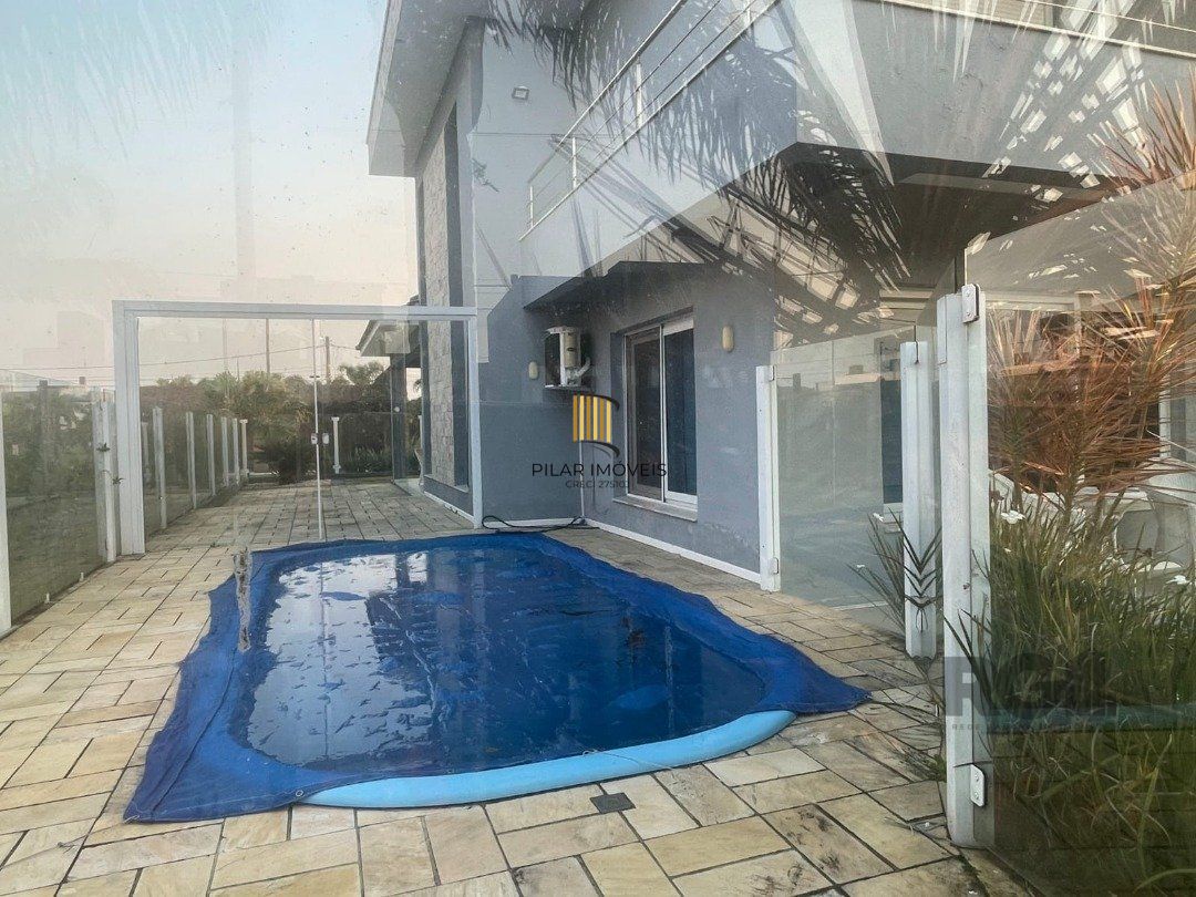 Casa de Condomínio 5 dormitórios no bairro Atlântida Sul
