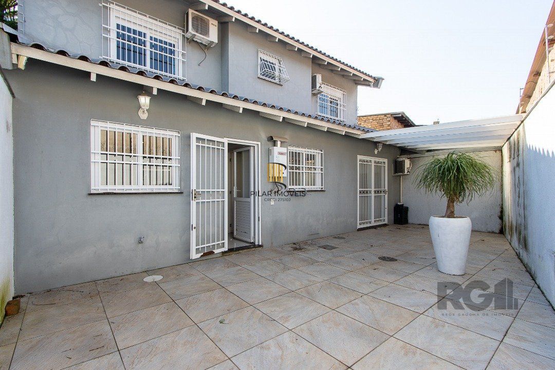 Casa 4 dormitórios no bairro Nonoai