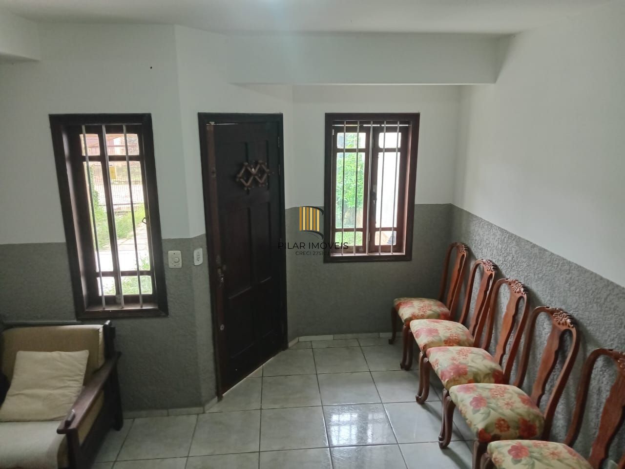 Excelente oportunidade de adquirir um sobrado no charmoso bairro Guarujá