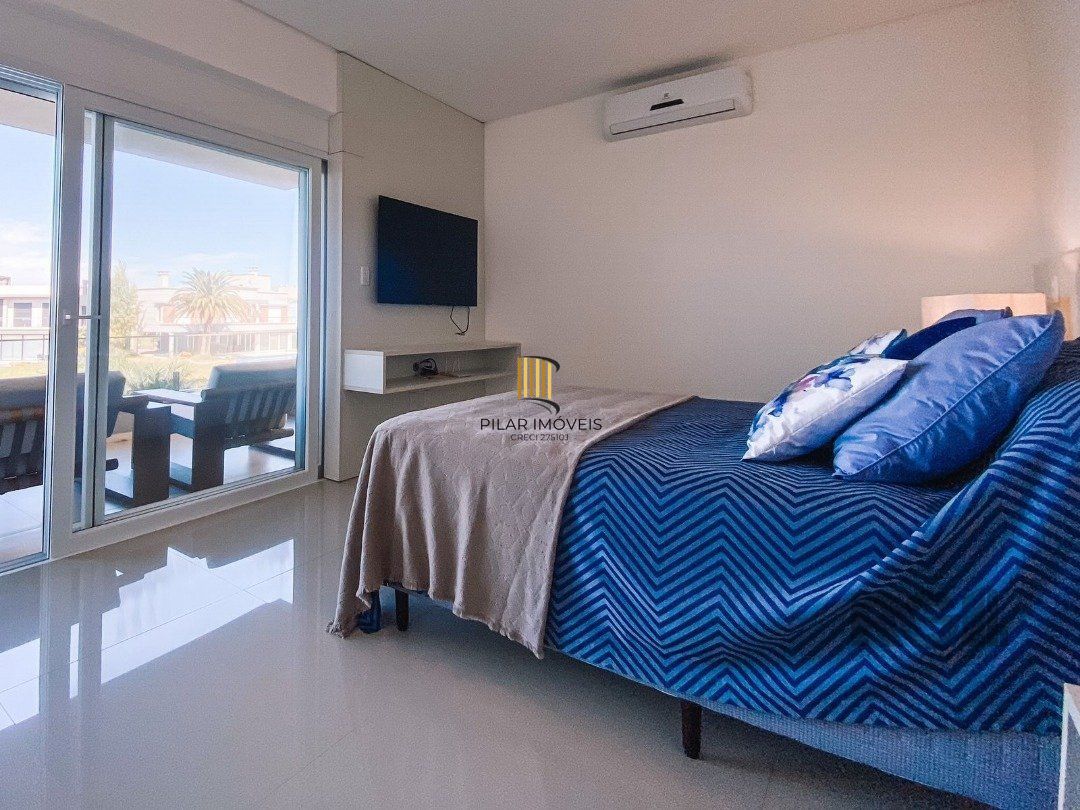 Casa de Condomínio 5 dormitórios no bairro Atlântida Sul