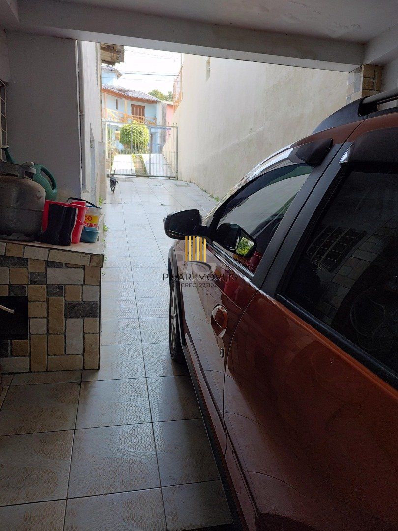 Casa 3 dormitórios no bairro Partenon