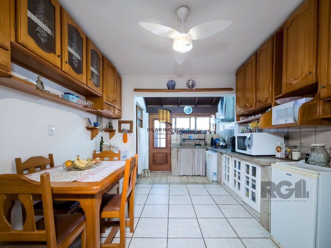 Casa de Condomínio 3 dormitórios no bairro Cavalhada