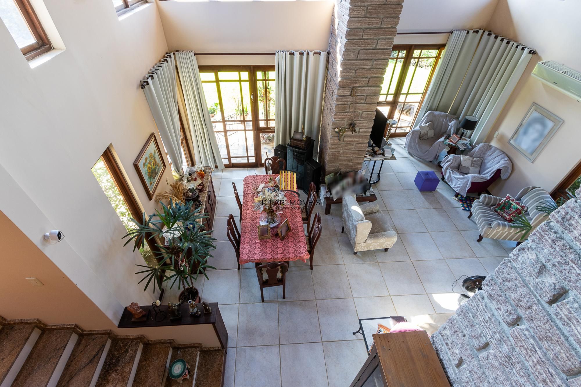 Casa em condomínio á venda com 6 dormitórios em Porto Alegre