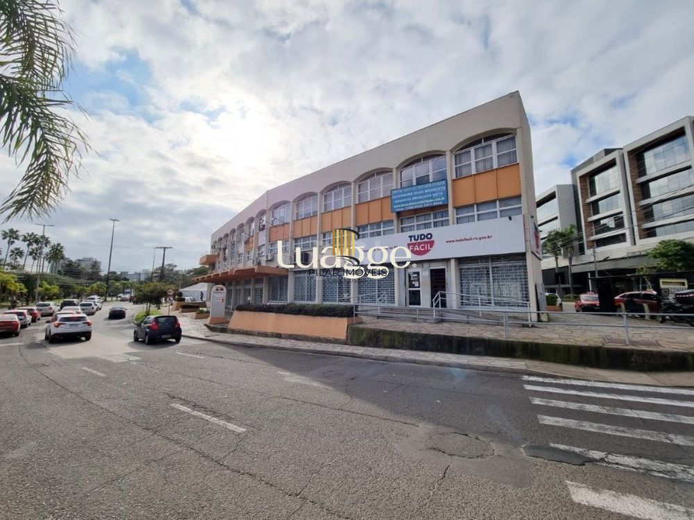 Sala comercial com 22m² de área privativa, frente, piso cerâmico, equipada com lavabo e ar-condicionado split