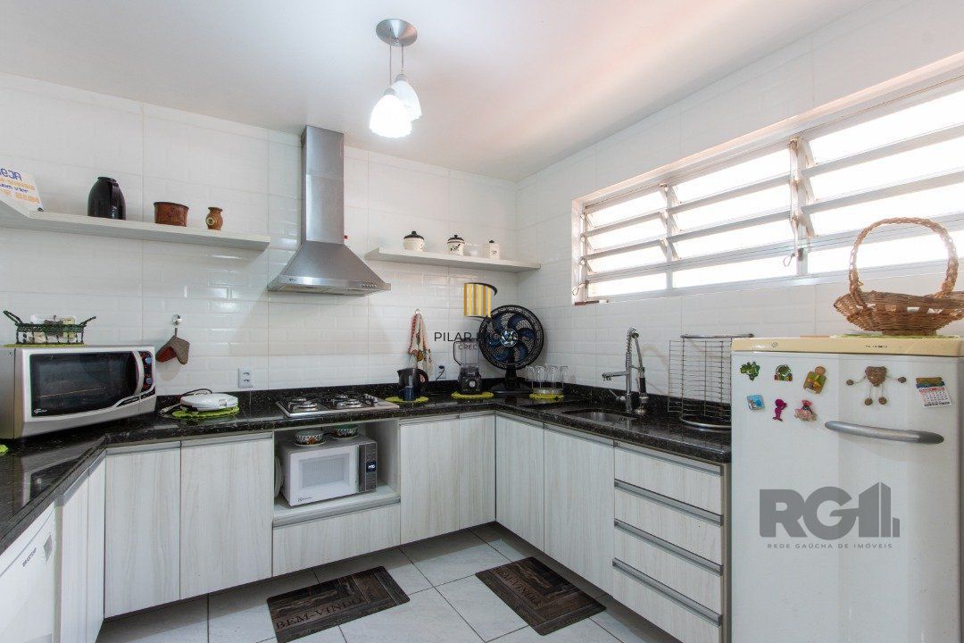 Casa 4 dormitórios no bairro Tristeza