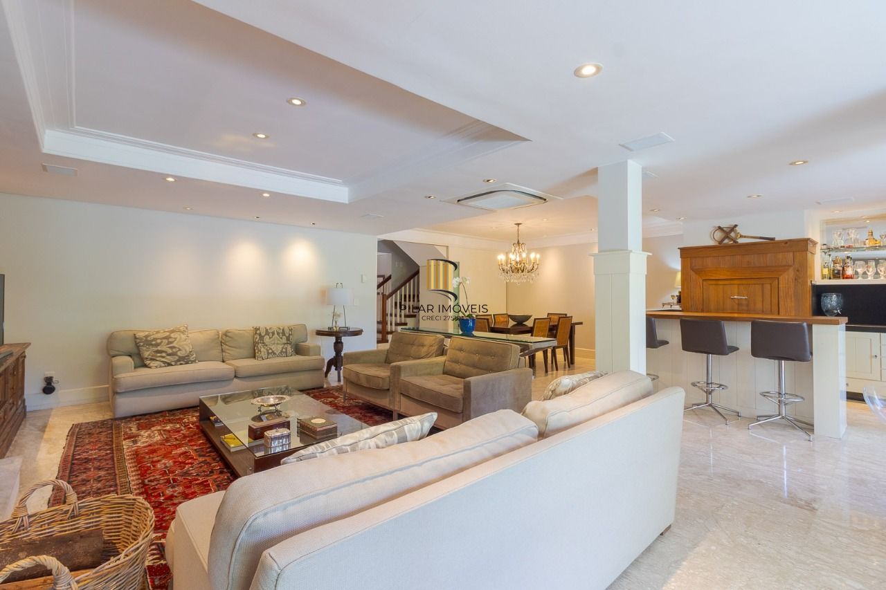 Casa em Condomínio com 487m² | 4 Dormitórios sendo 4 suítes, 3 vagas, no Bairro Três Figueiras, Porto Alegre