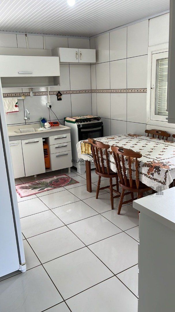 Casa 4 dormitórios no bairro Arroio Teixeira