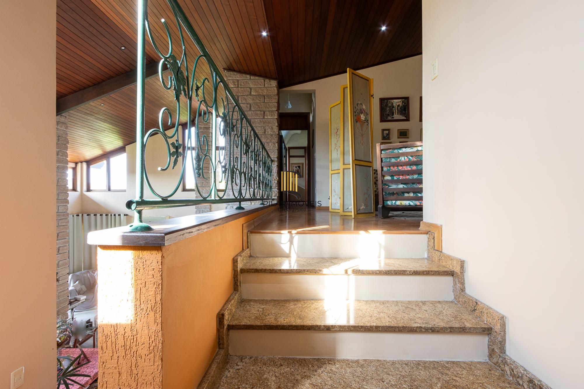 Casa em condomínio á venda com 6 dormitórios em Porto Alegre