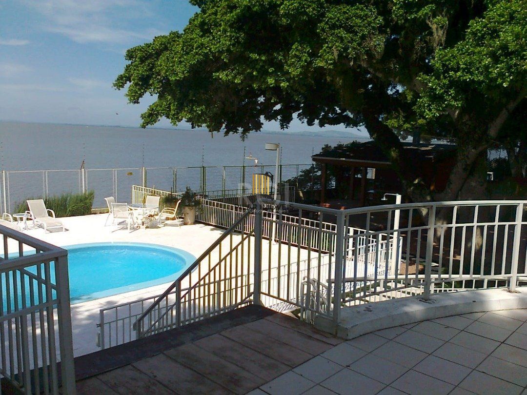 casa em condomínio fechado, às margens do rio guaíba,