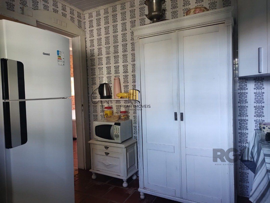 Casa 5 dormitórios no bairro Atlântida