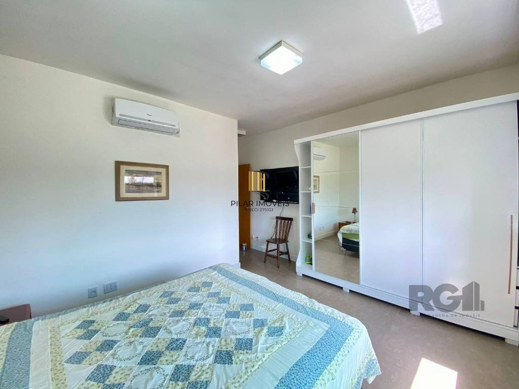 Casa a venda em Condomínio fechado na Beira mar de Atlântida Sul com 3 quartos e 164m²