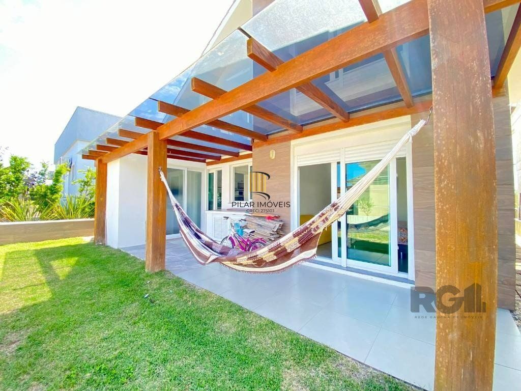 Casa a venda em Condomínio fechado na Beira mar de Atlântida Sul com 3 quartos e 164m²