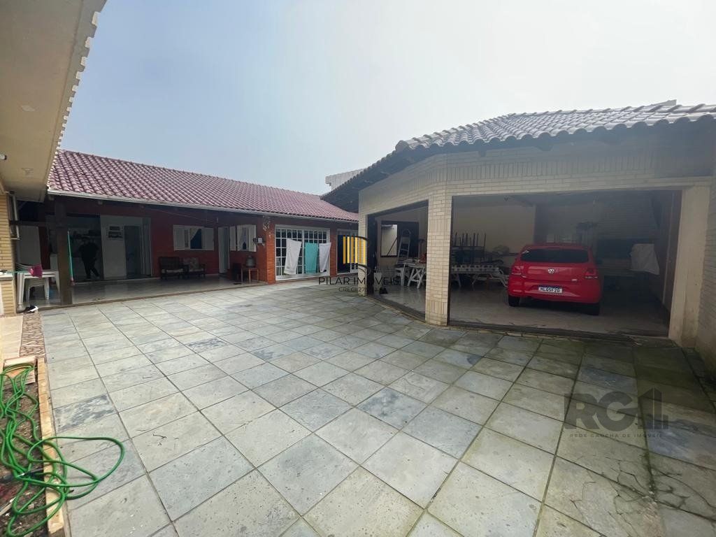 Casa com 6 dormitórios em Atlântida