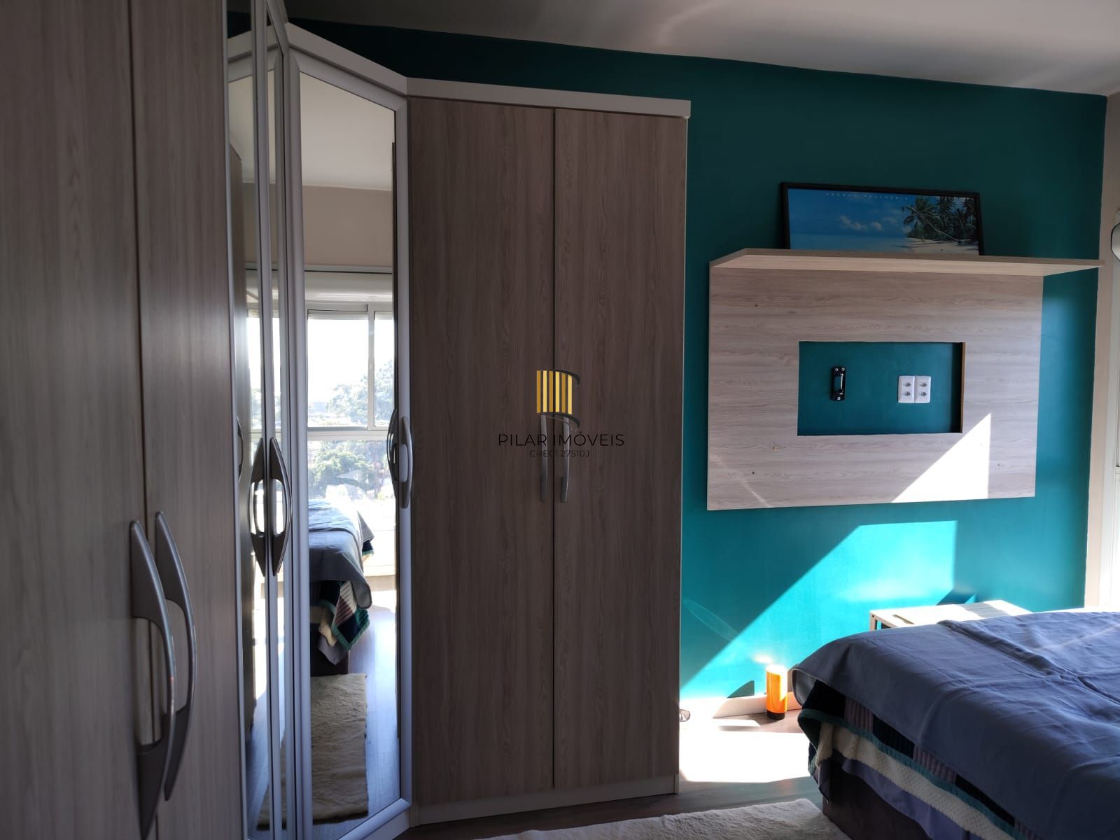 Cobertura de 3 dormitórios, 1 suíte, 2 vagas escrituradas e vista para o Guaíba.