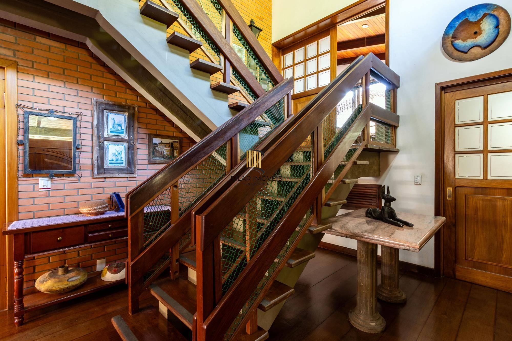 Casa de Condomínio 4 dormitórios no bairro Cavalhada