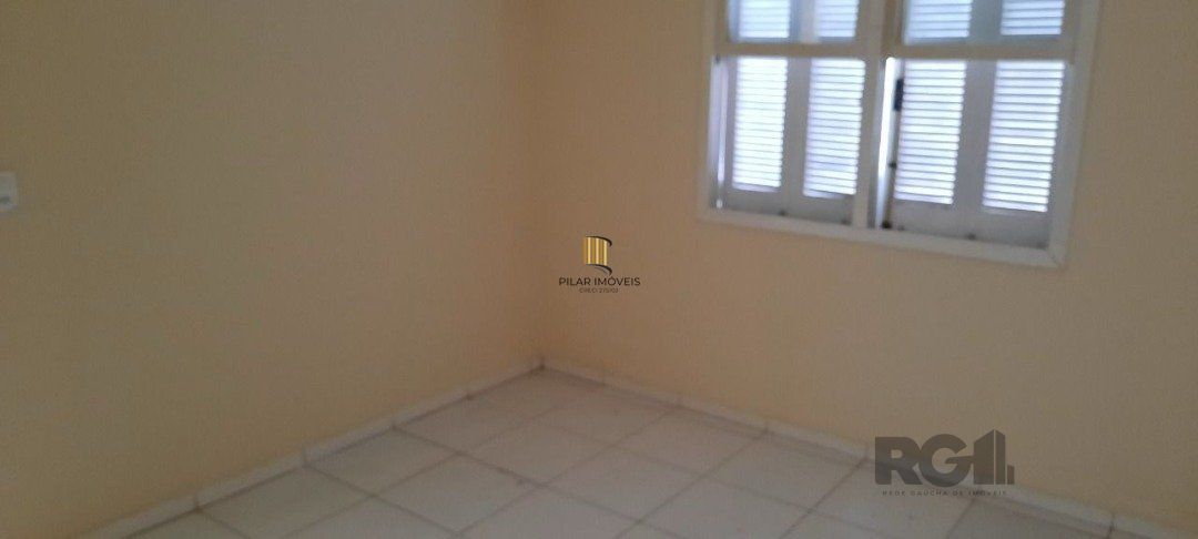 Oportunidade Imperdível: Prédio com 4 Apartamentos, Pátio e 2 Vagas de Garagem