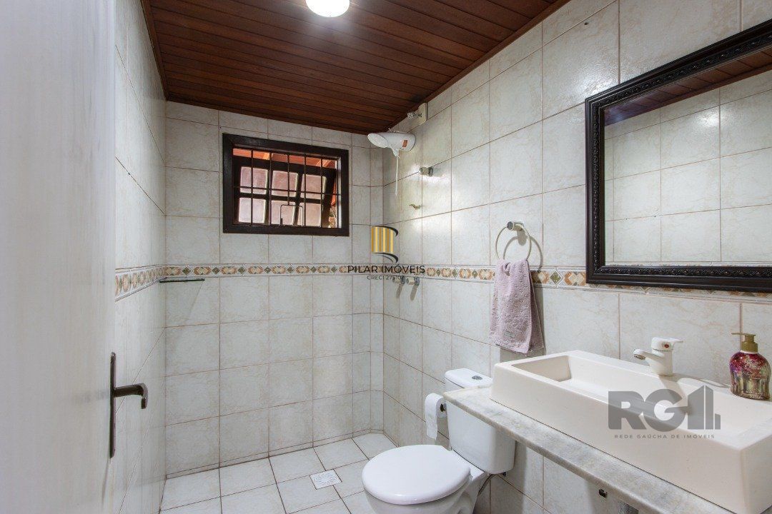 Casa 3 dormitórios no bairro Camaquã