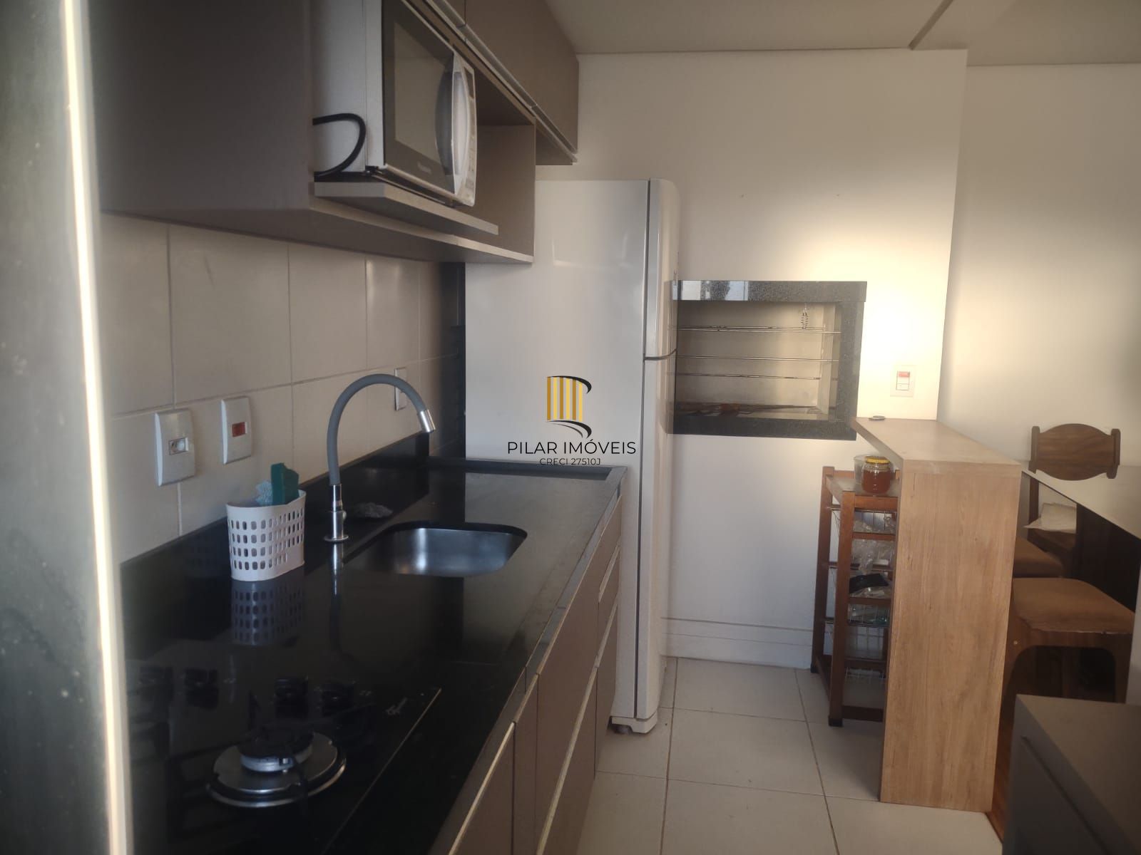 Apartamento no Condomínio Live It, 2 dormitórios, suíte, churrasqueira, vaga coberta.