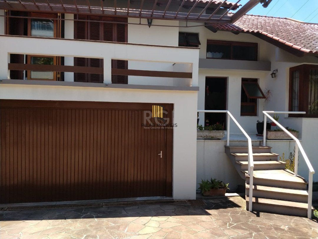 Casa Condominio para Venda - 308m², 5 dormitórios, sendo 1 suites, 3 vagas - Nonoai
