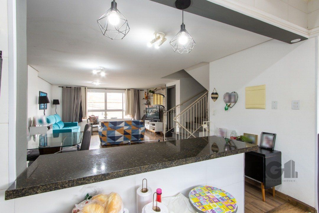 Casa 3 dormitórios no bairro Camaquã