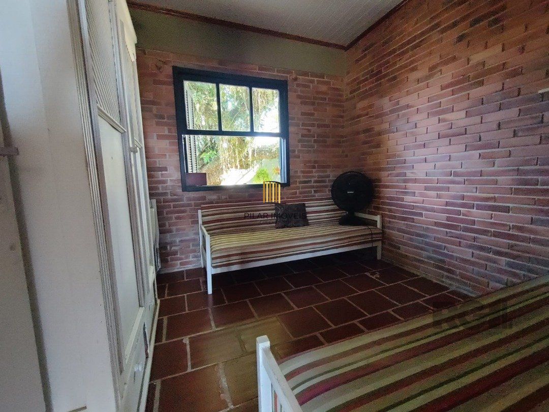 Casa 5 dormitórios no bairro Atlântida