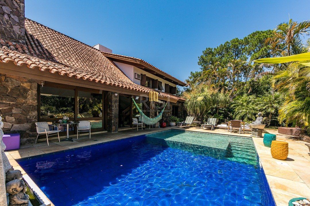 Casa para Venda - 370m², 5 dormitórios, sendo 2 suites, 7 vagas - Vila Assunção