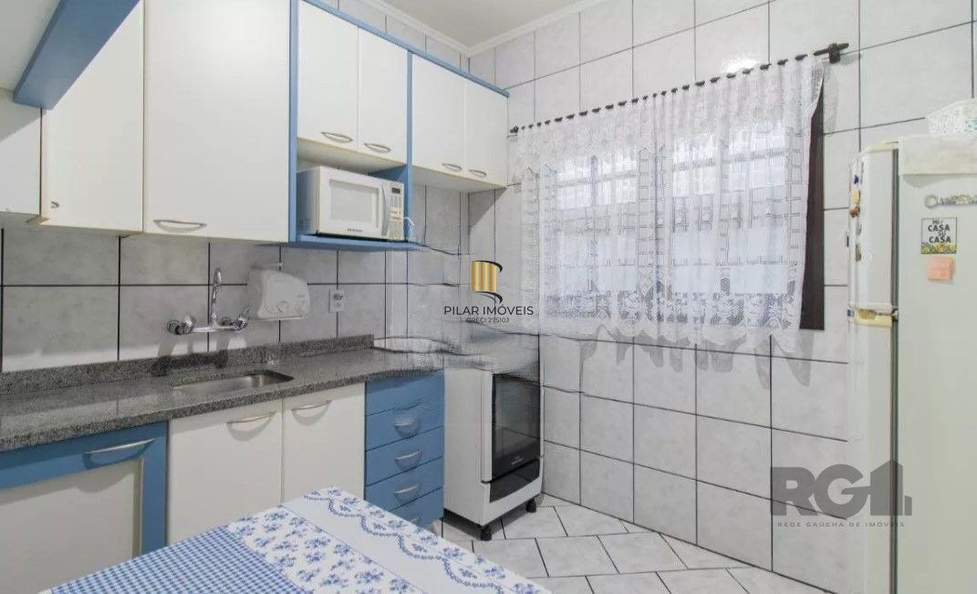 Casa de Condomínio 3 dormitórios no bairro Vila Nova