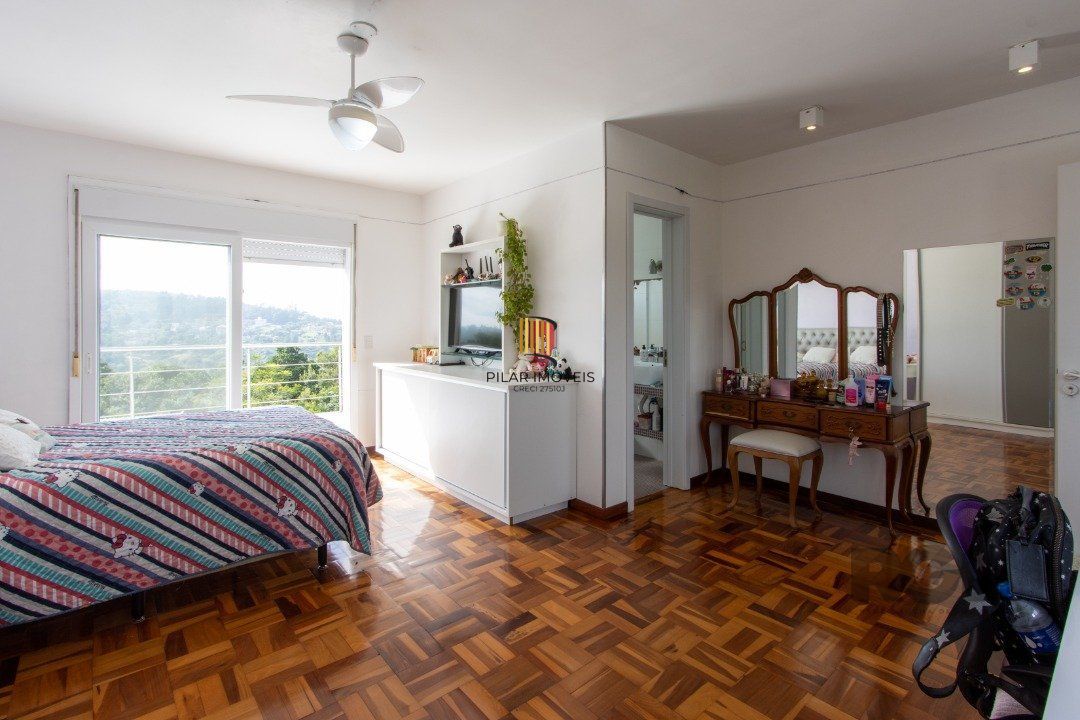 Casa de Condomínio 4 dormitórios no bairro Vila Nova