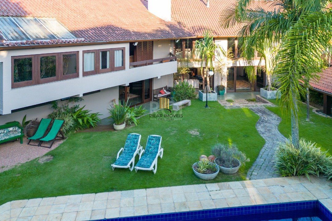 Casa de Condomínio 8 dormitórios no bairro Cavalhada