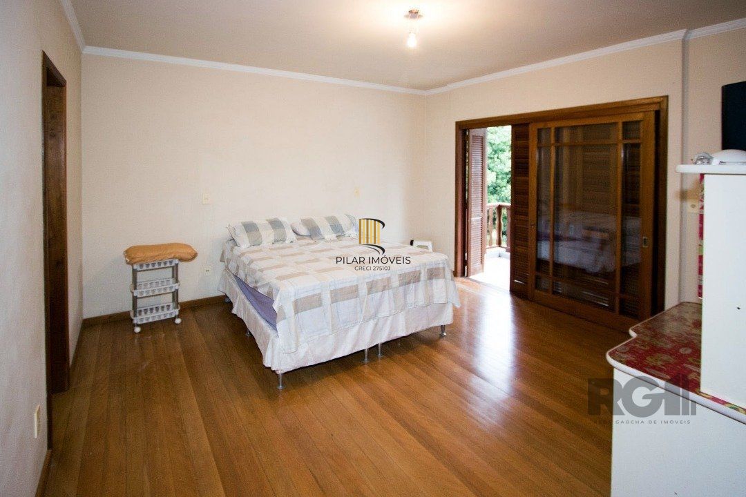 Sobrado com 6 suites, lareira, lavabo, pátio - Bairro Belém Velho