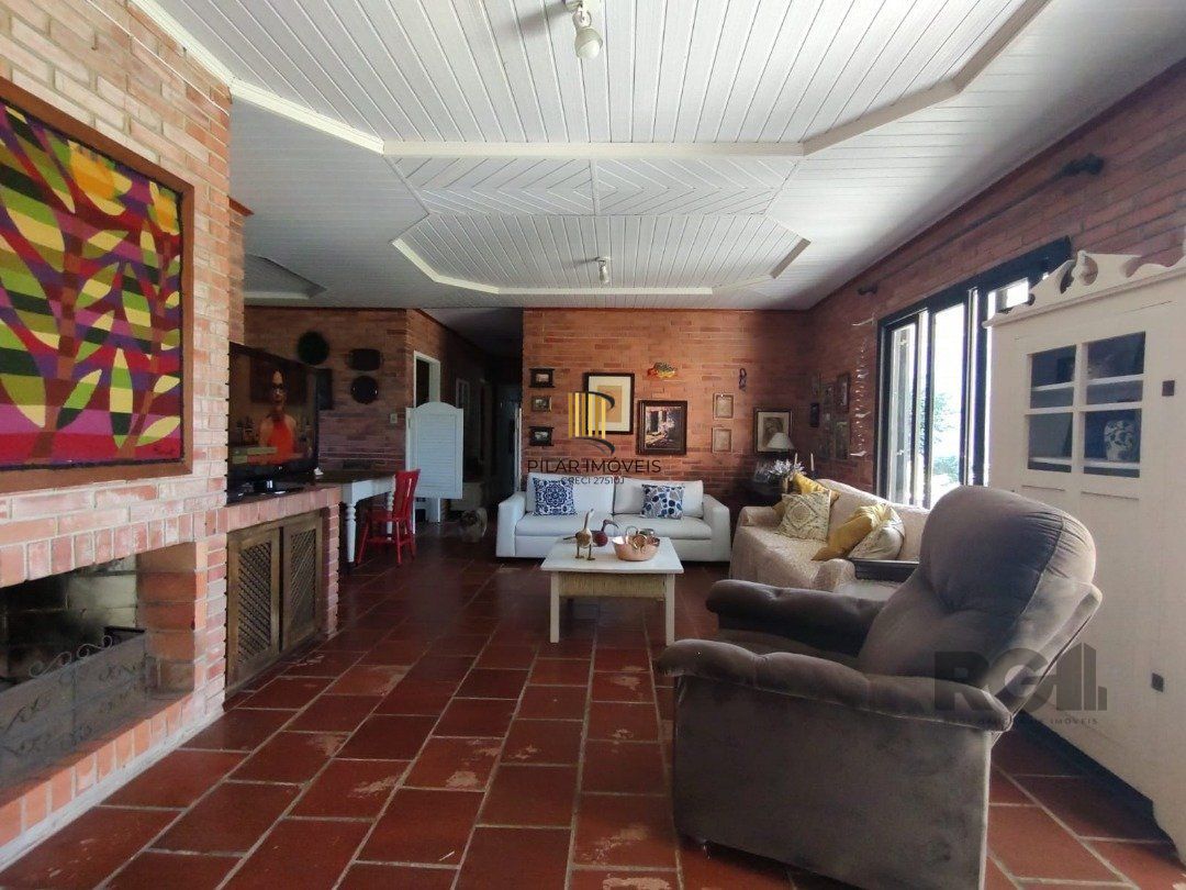 Casa 5 dormitórios no bairro Atlântida