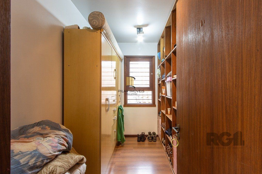 Casa de Condomínio 6 dormitórios no bairro Cavalhada