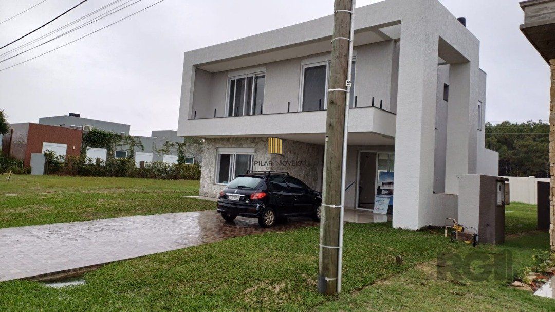 Casa de Condomínio 4 dormitórios no bairro Praia da Conceição