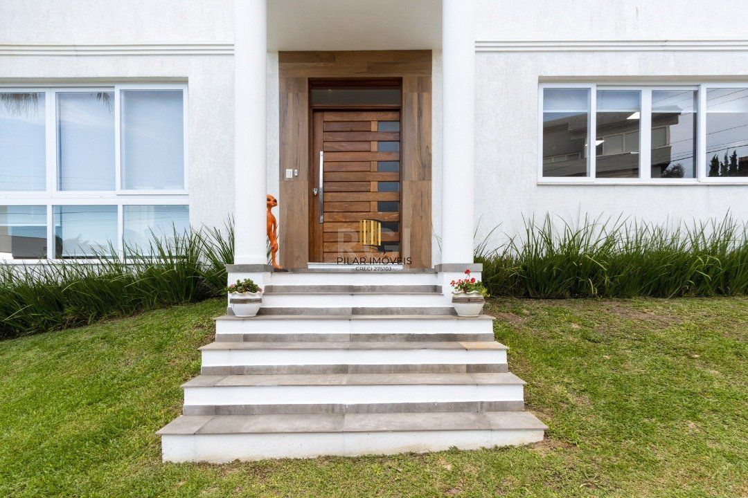 Casa de Condomínio 6 dormitórios no bairro Nonoai