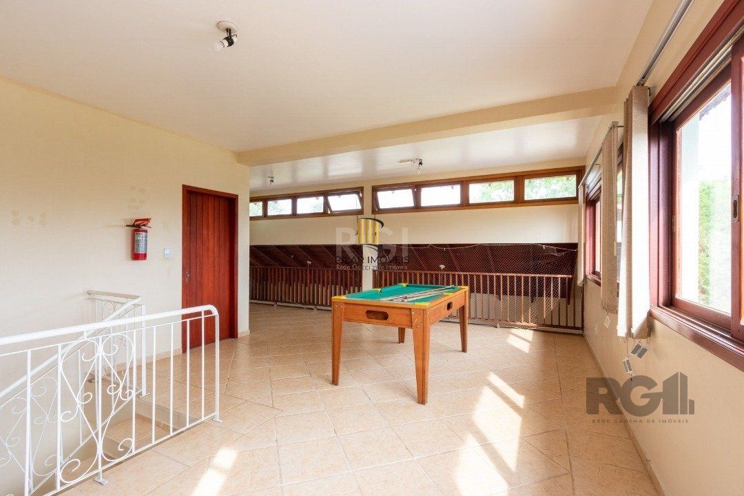 Casa de Condomínio 4 dormitórios no bairro Cavalhada