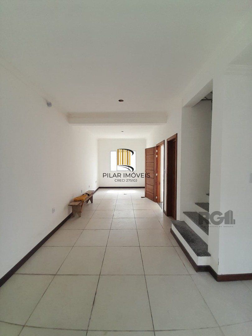 Casa de Condomínio 3 dormitórios no bairro Camaquã