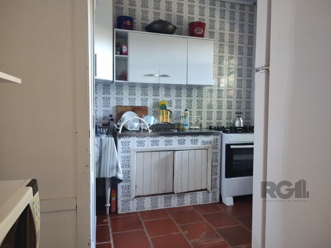 Casa 5 dormitórios no bairro Atlântida