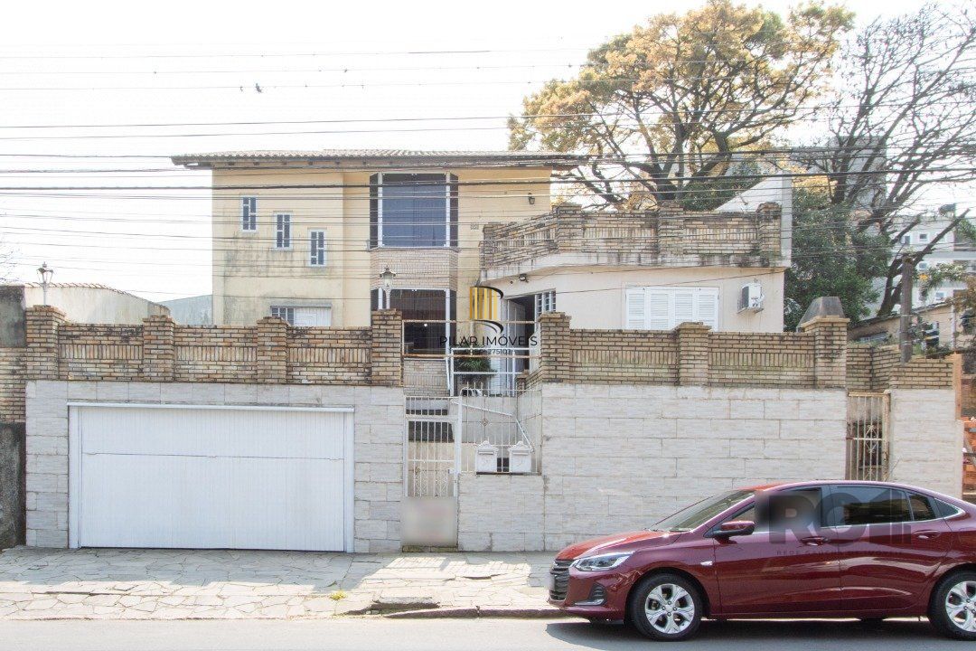Casa 6 dormitórios no bairro Tristeza