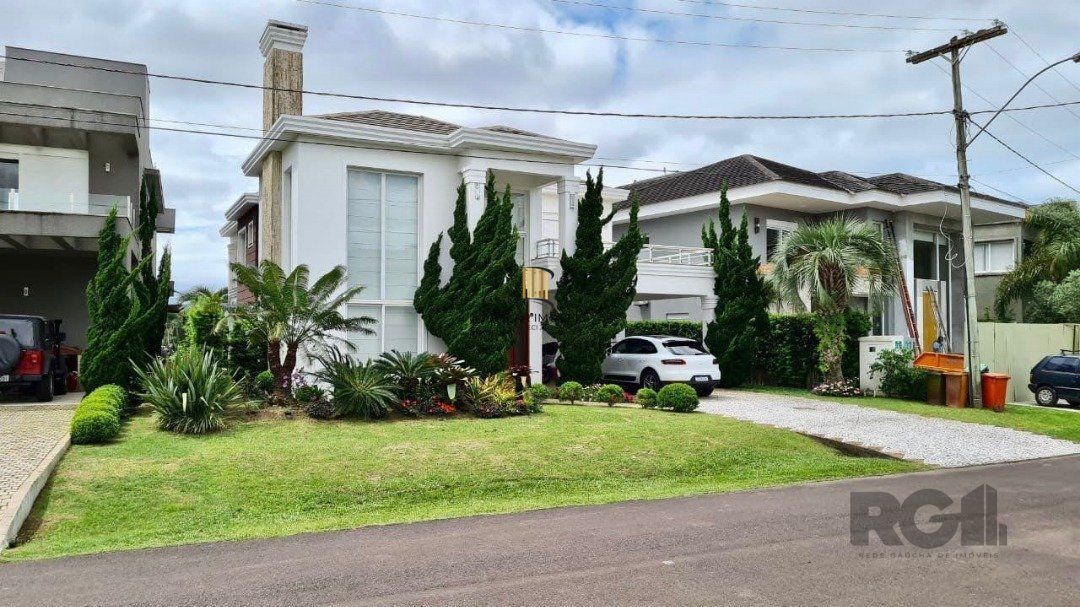 Casa de Condomínio 4 dormitórios no bairro Atlântida - Pilar Imóveis