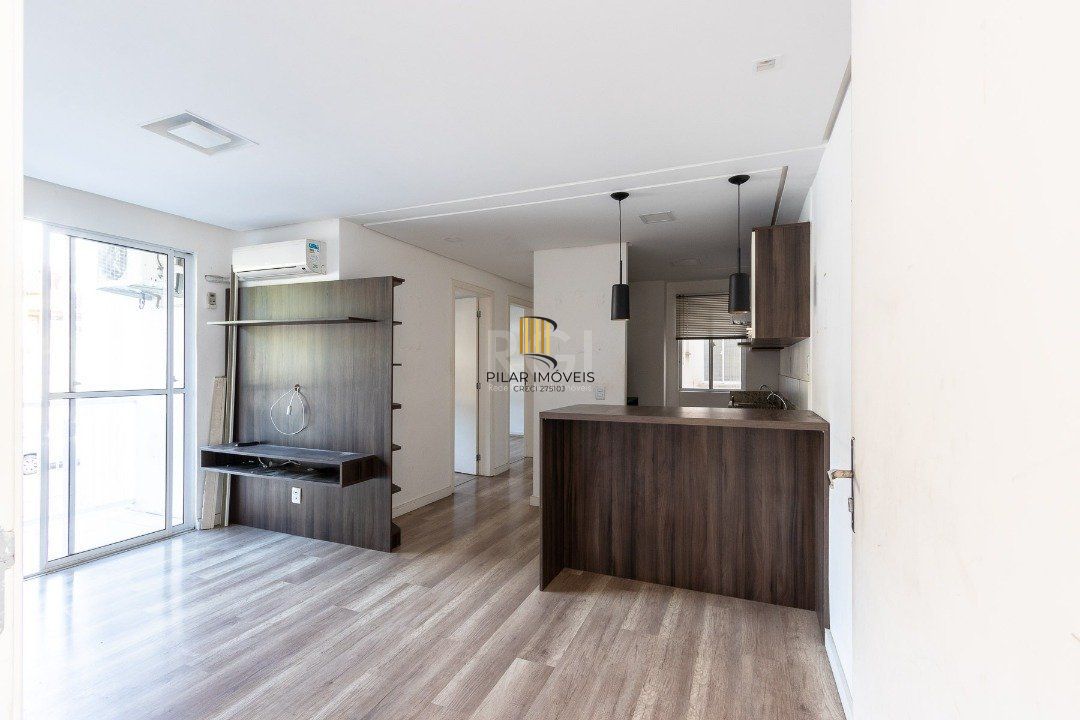 Apartamento 2 dormitórios , sala com dois ambientes , cozinha americana sacada com churrasqueira 1 vaga - Pilar Imóveis