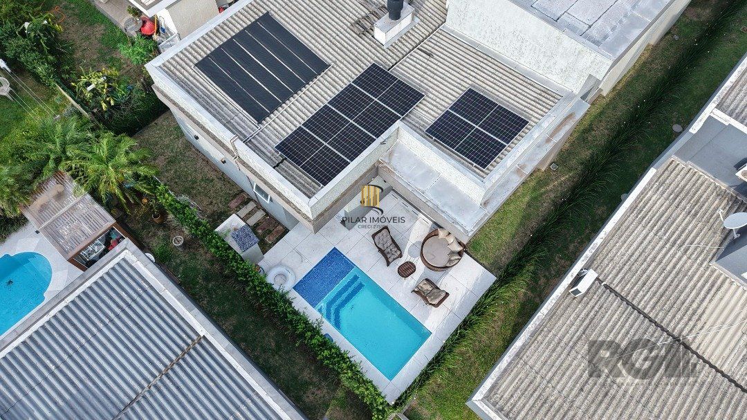 Casa de Condomínio 4 dormitórios no bairro Dubai