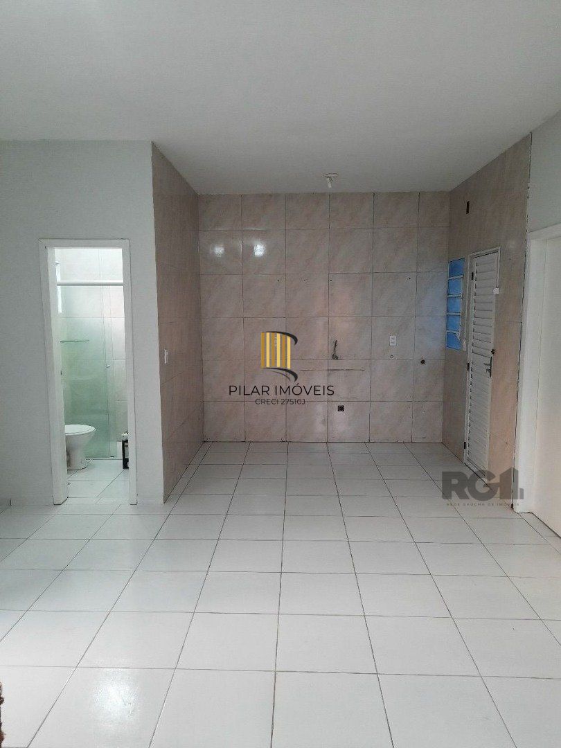 Oportunidade Imperdível: Prédio com 4 Apartamentos, Pátio e 2 Vagas de Garagem