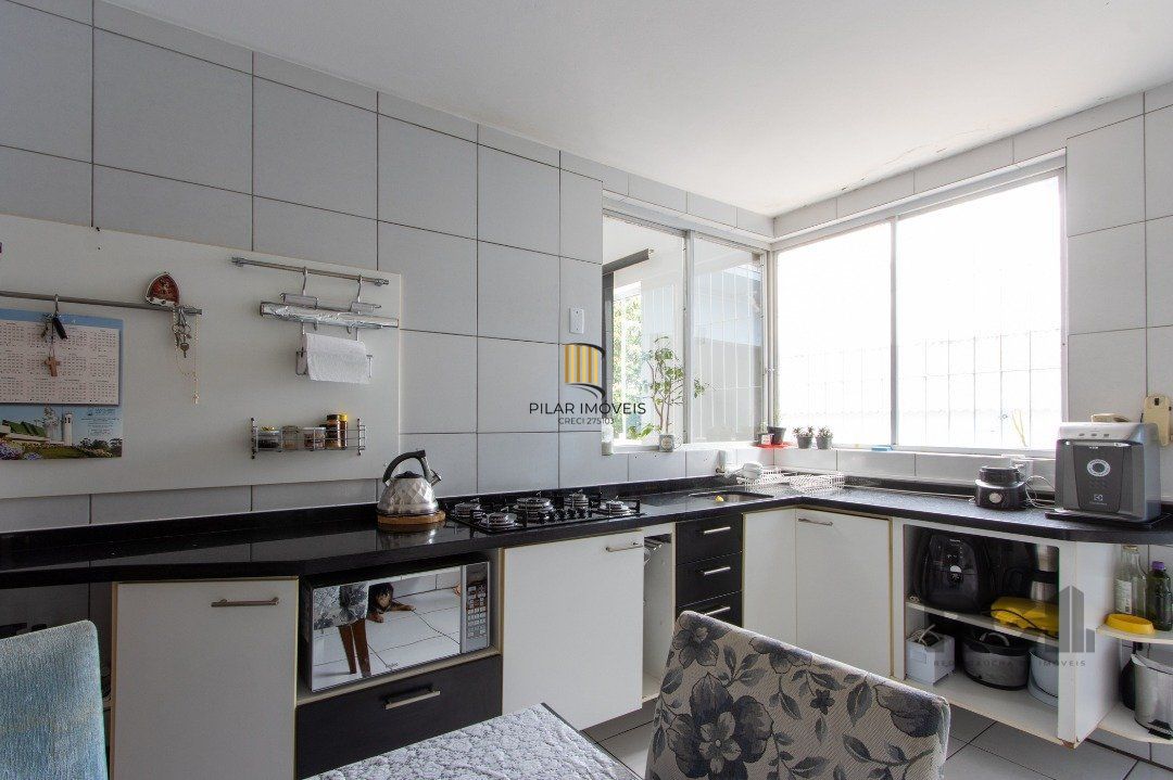 Casa, 5 dormitórios, sendo 1 suíte, 312m² privativos, 8 vagas - Bairro Vila Nova