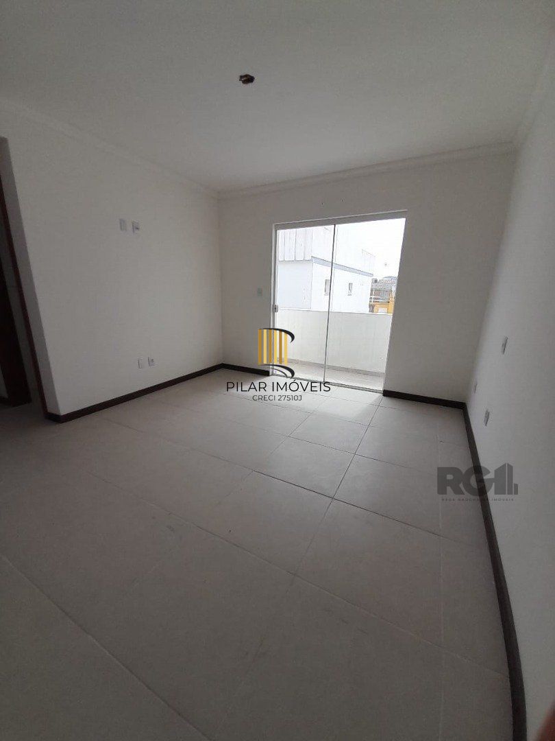 Casa de Condomínio 3 dormitórios no bairro Camaquã
